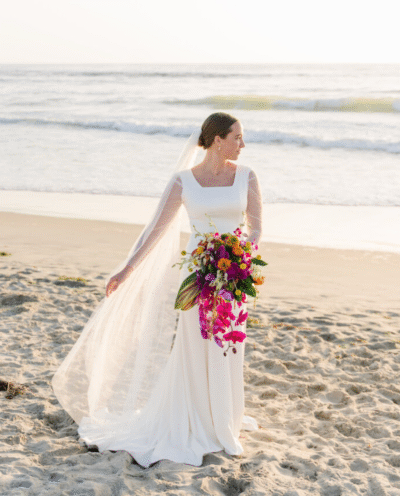 bride-on-southern-california-beach-with-bouquet